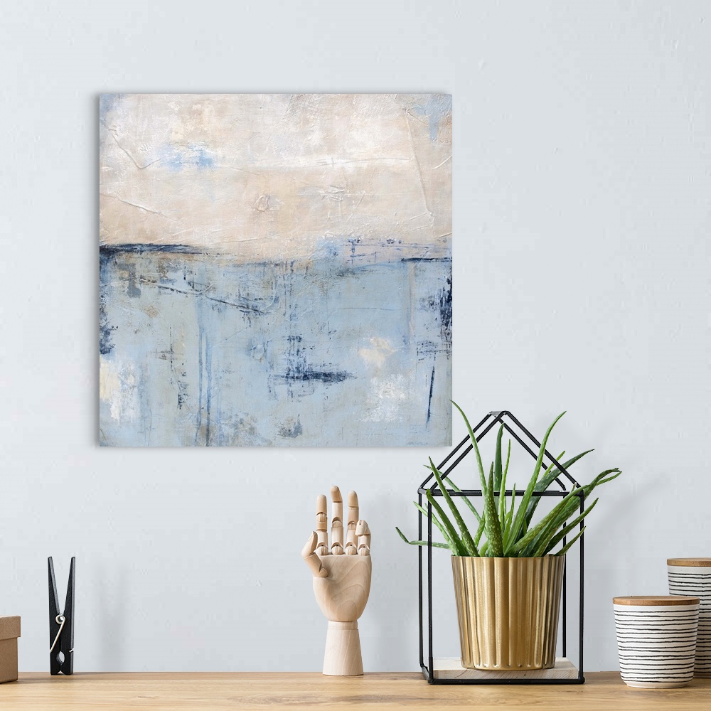 A bohemian room featuring Contemporary abstract painting in pale blue and white.