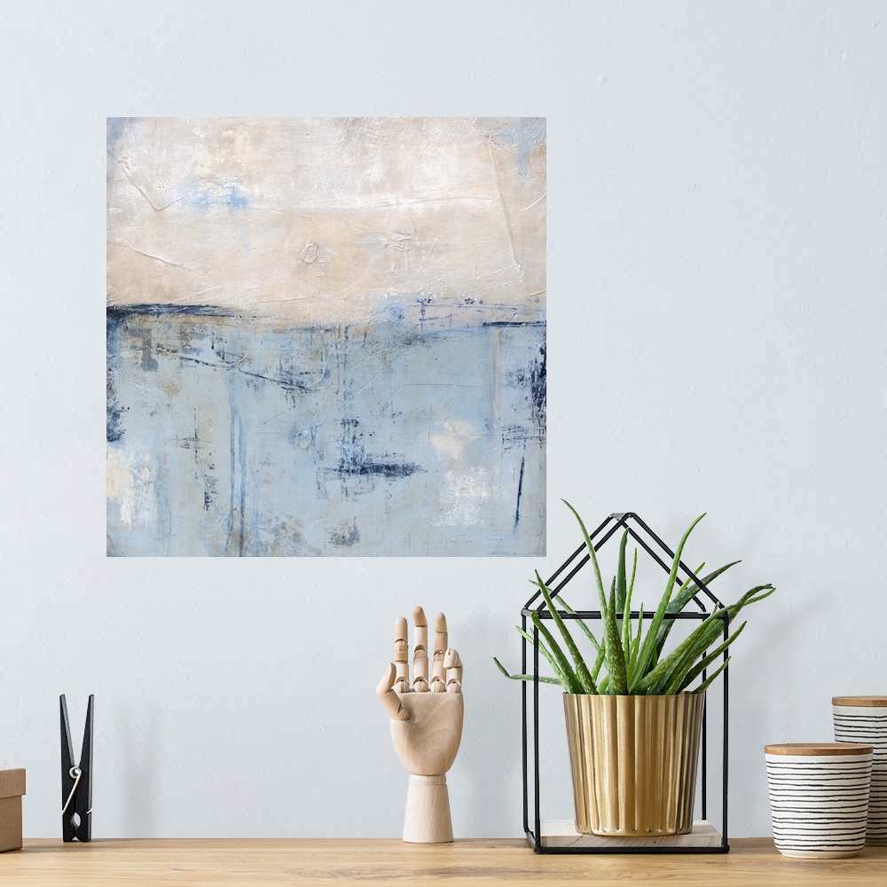 A bohemian room featuring Contemporary abstract painting in pale blue and white.