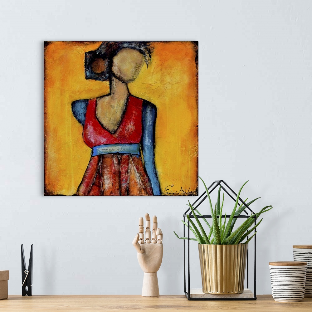 A bohemian room featuring Contemporary abstract painting of a female figure with a missing face.