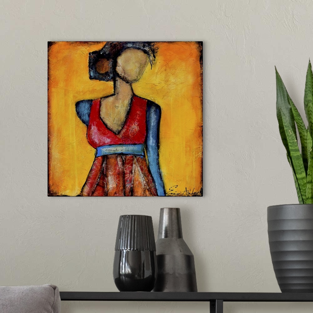 A modern room featuring Contemporary abstract painting of a female figure with a missing face.