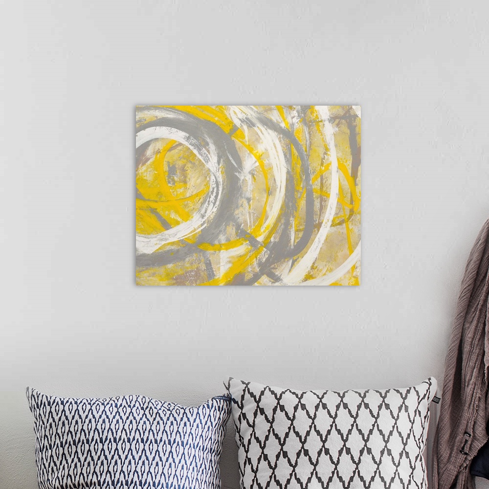 A bohemian room featuring Contemporary abstract painting using bright yellow and gray.