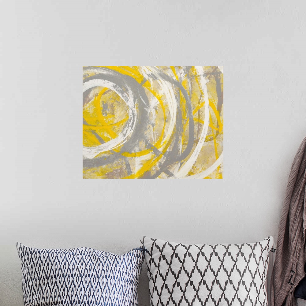 A bohemian room featuring Contemporary abstract painting using bright yellow and gray.