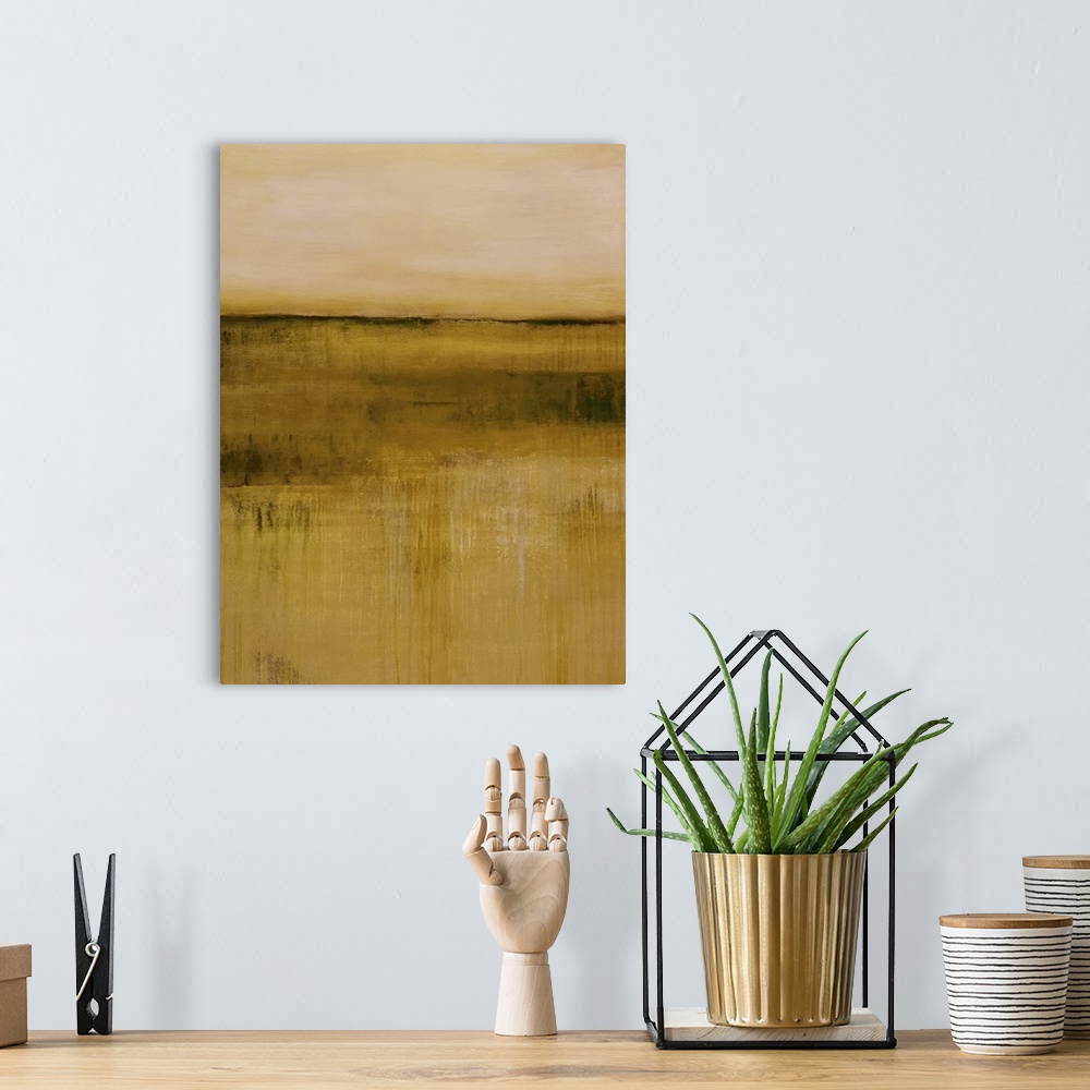 A bohemian room featuring Contemporary abstract painting using golden earth tones.
