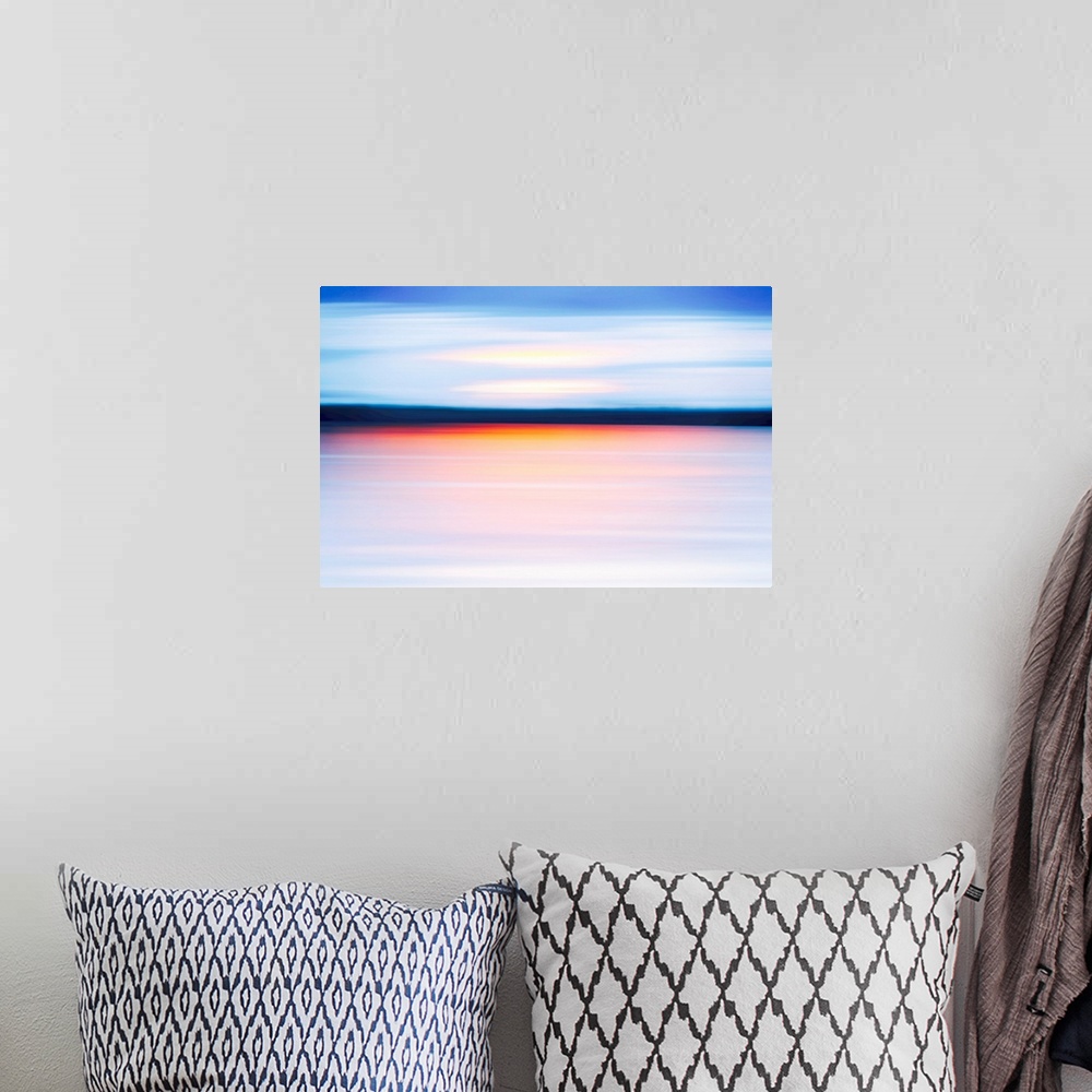 A bohemian room featuring Abstract of lake at sunset.