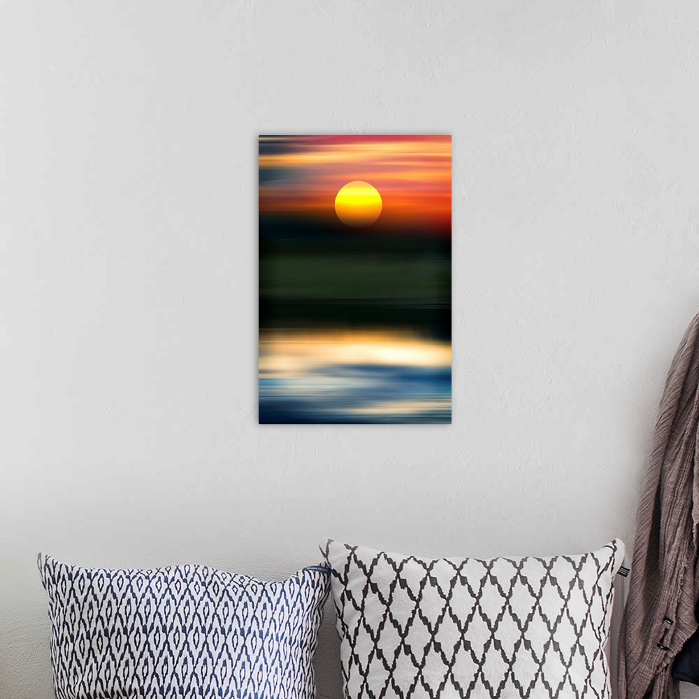 A bohemian room featuring Abstract of sun over water.