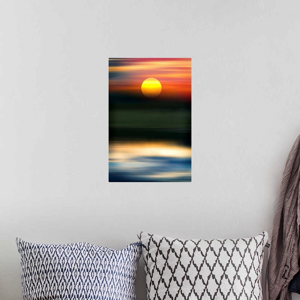 A bohemian room featuring Abstract of sun over water.