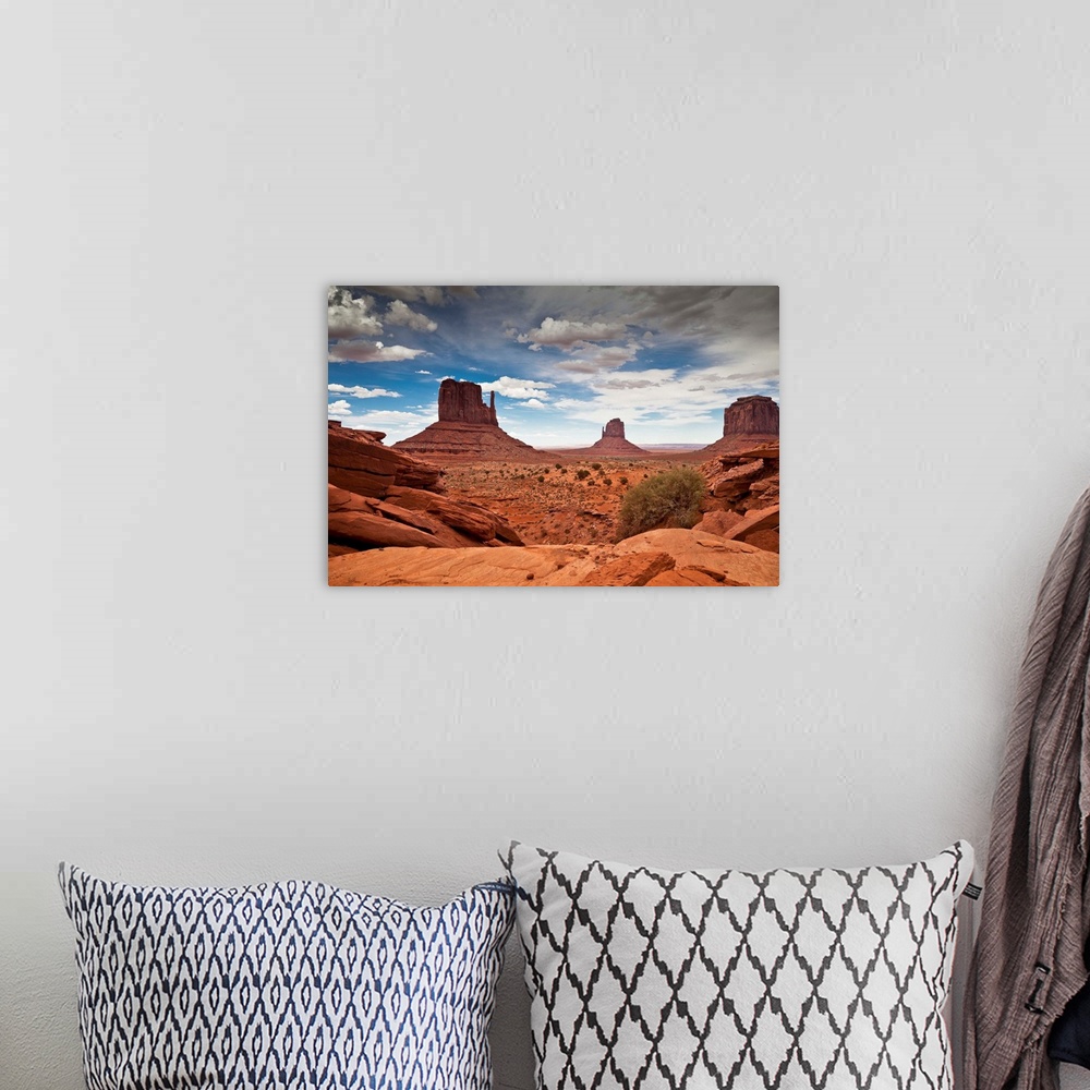 A bohemian room featuring USA, Arizona, Monument Valley Tribal Park, Monument Valley, Navajo Nation sandstone mesas and but...