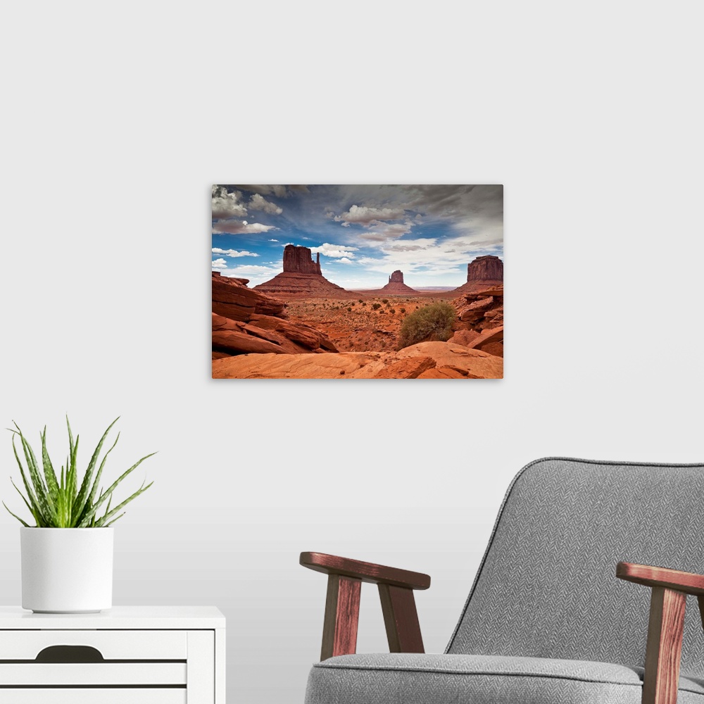A modern room featuring USA, Arizona, Monument Valley Tribal Park, Monument Valley, Navajo Nation sandstone mesas and but...