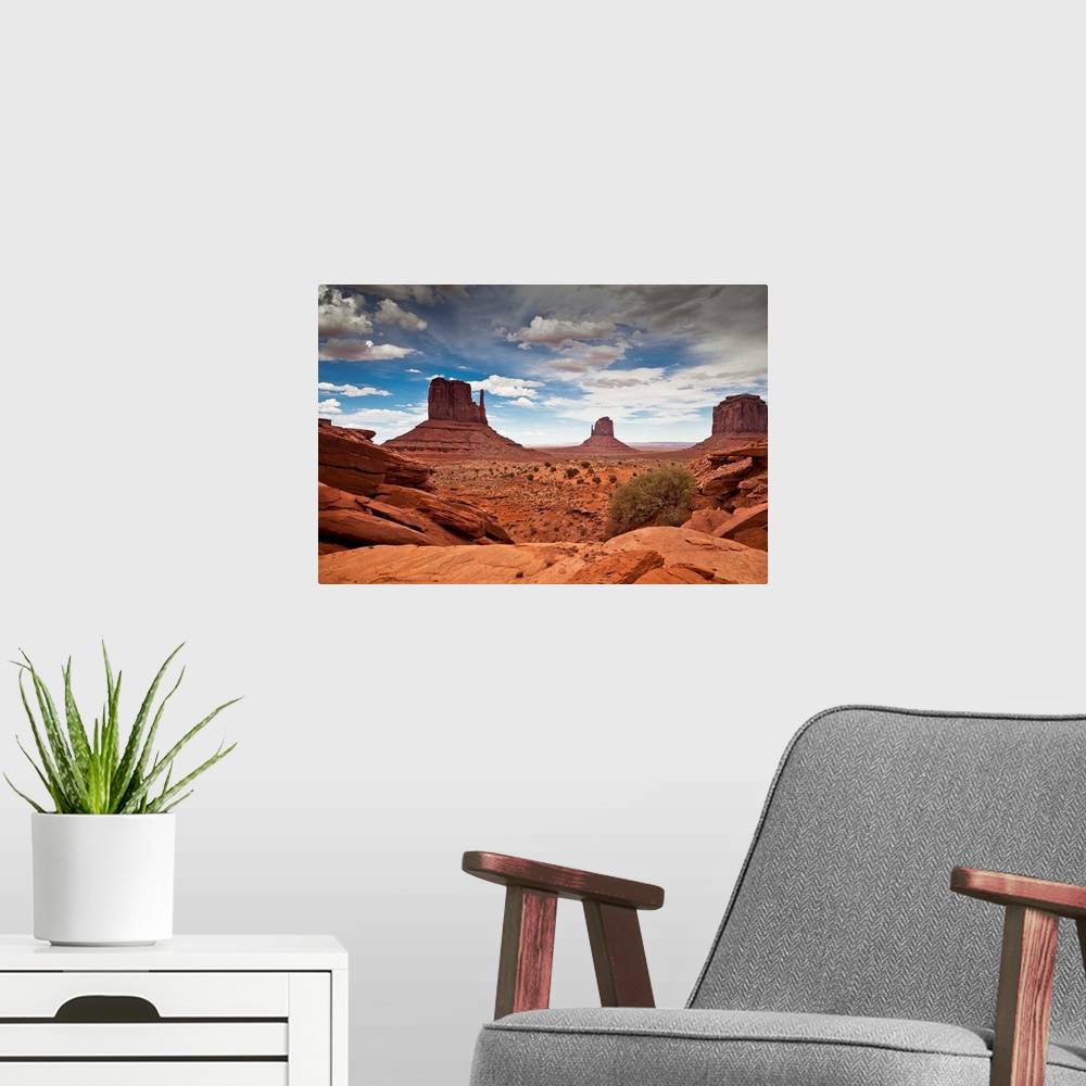 A modern room featuring USA, Arizona, Monument Valley Tribal Park, Monument Valley, Navajo Nation sandstone mesas and but...