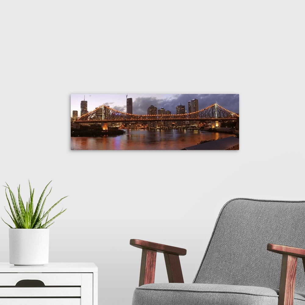 A modern room featuring Australia, Queensland, Brisbane, Story Bridge at sunset