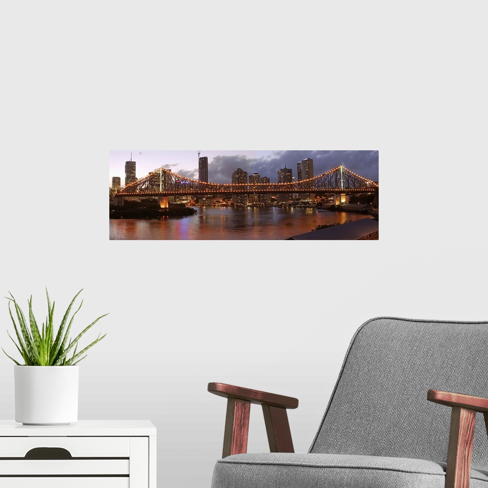 A modern room featuring Australia, Queensland, Brisbane, Story Bridge at sunset