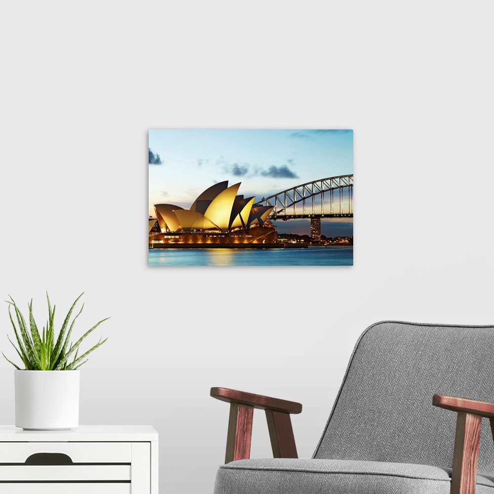 A modern room featuring Australia, Sydney Opera House, Sydney Harbor Bridge, Sydney Opera House in the evening