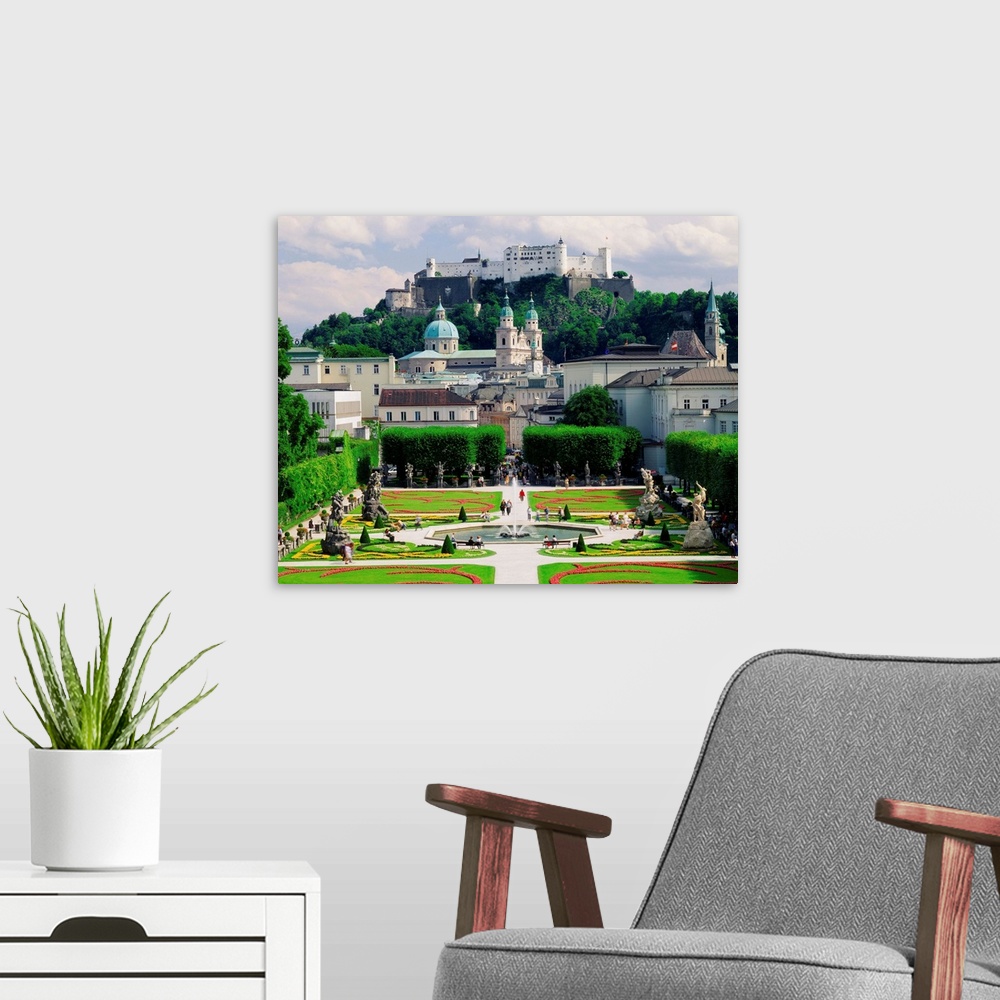 A modern room featuring Austria, Salzburg, Mirabell Castle, view of the park towards Hohensalzburg Fortress