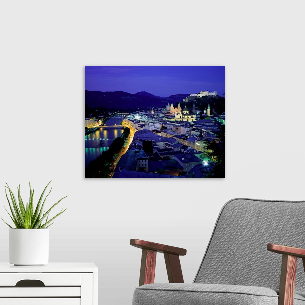 A modern room featuring Austria, Salzburg, Night view on Salzach river and old town