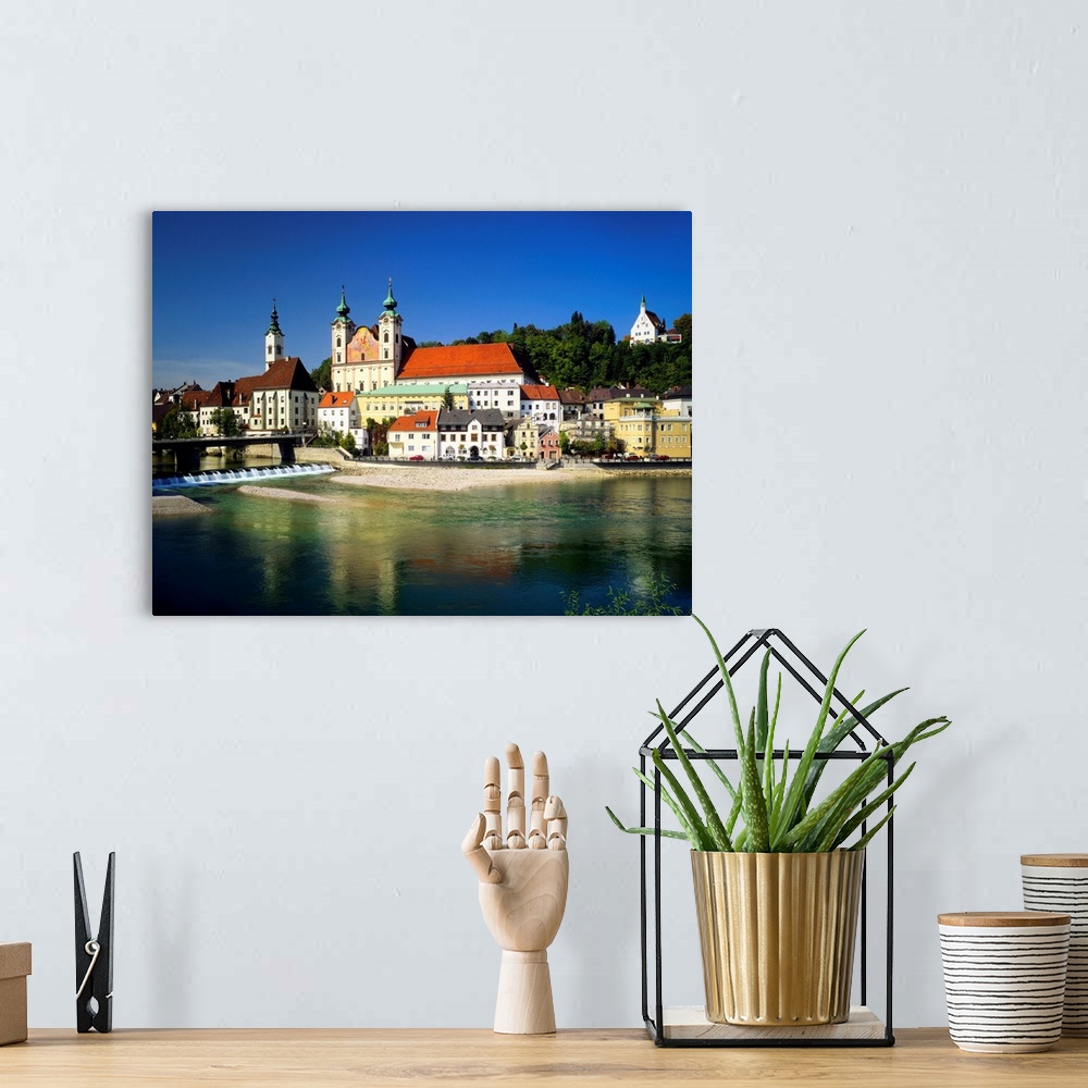 A bohemian room featuring Austria, Steyr, view of the town and the Enns river