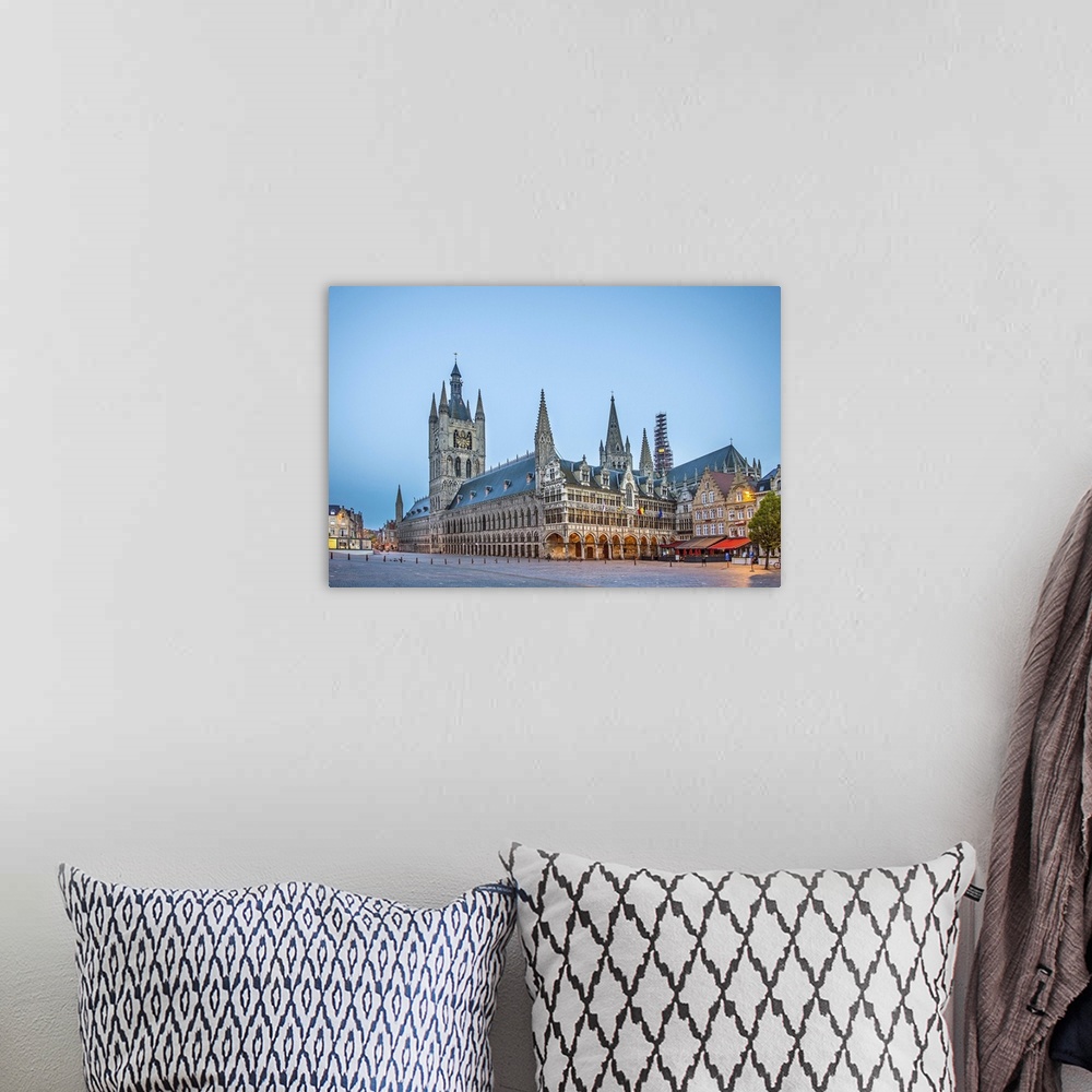 A bohemian room featuring Belgium, Flanders, Ypres, Town centre at dawn with the building of In Flanders Fields Museum.