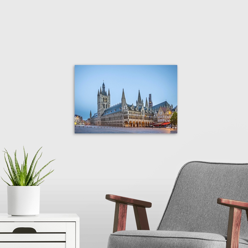 A modern room featuring Belgium, Flanders, Ypres, Town centre at dawn with the building of In Flanders Fields Museum.