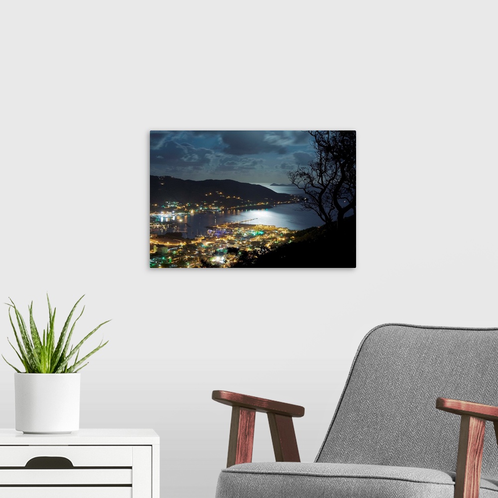A modern room featuring BVI, Tortola, Caribbean, View of Road Town during a full moon night