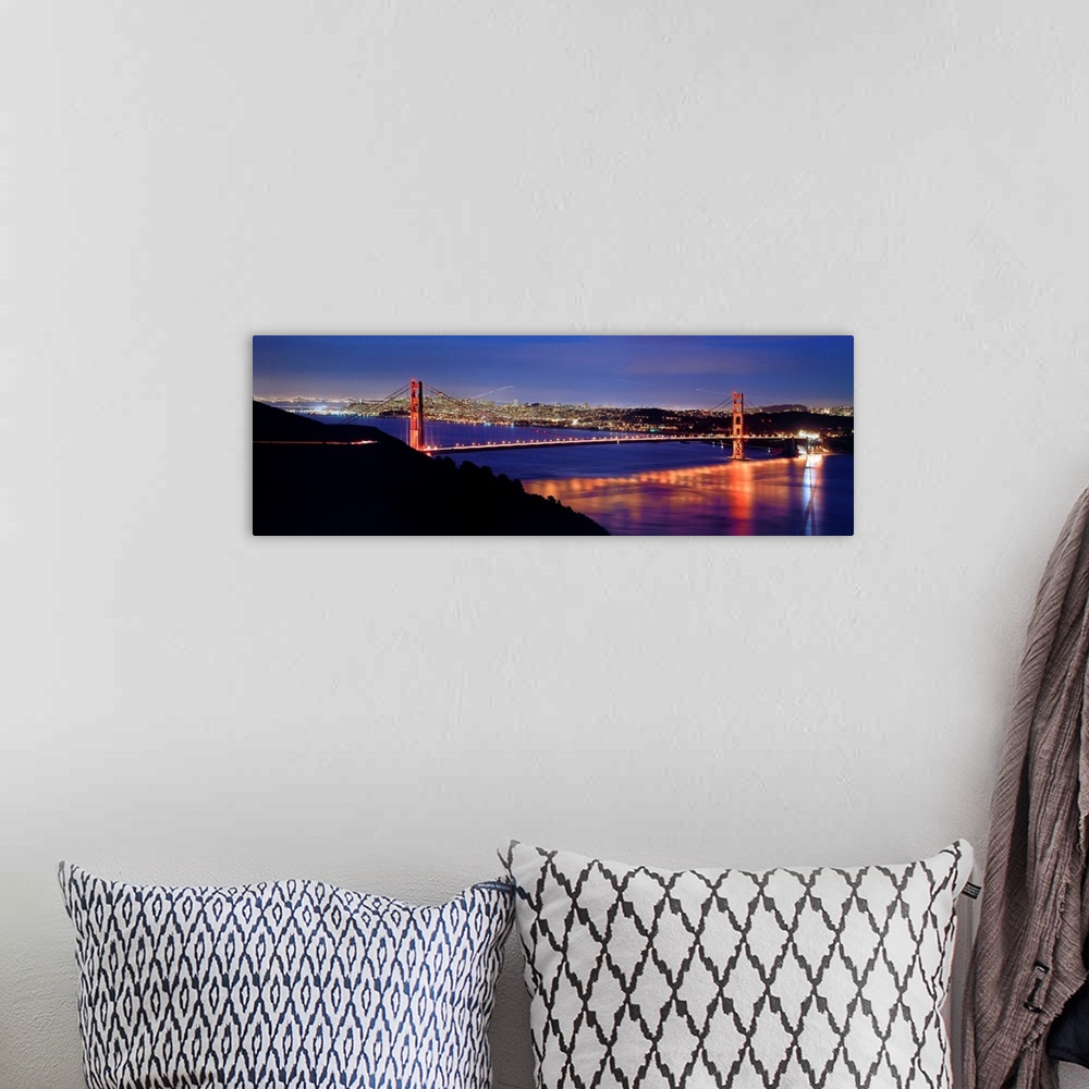 A bohemian room featuring CA, San Francisco, Golden Gate Bridge and the skyline at night