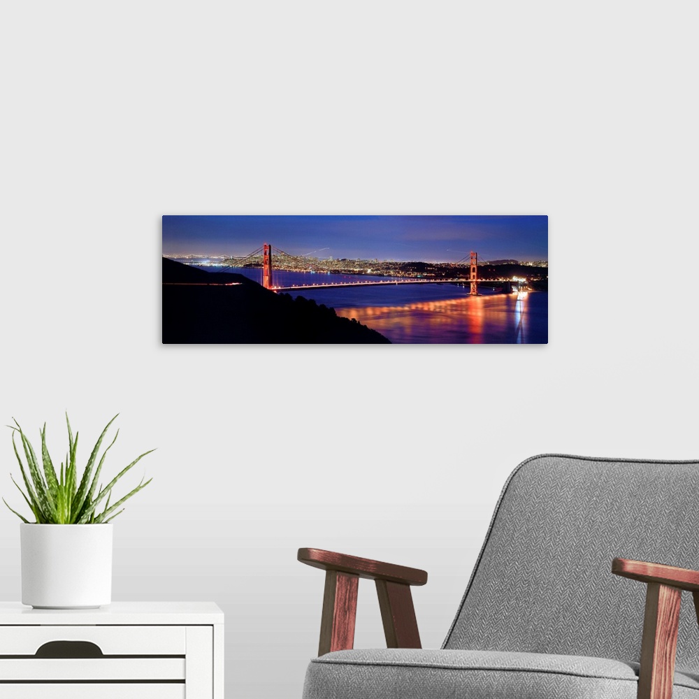 A modern room featuring CA, San Francisco, Golden Gate Bridge and the skyline at night