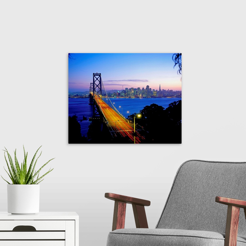 A modern room featuring California, San Francisco, Bay Bridge and skyline at night