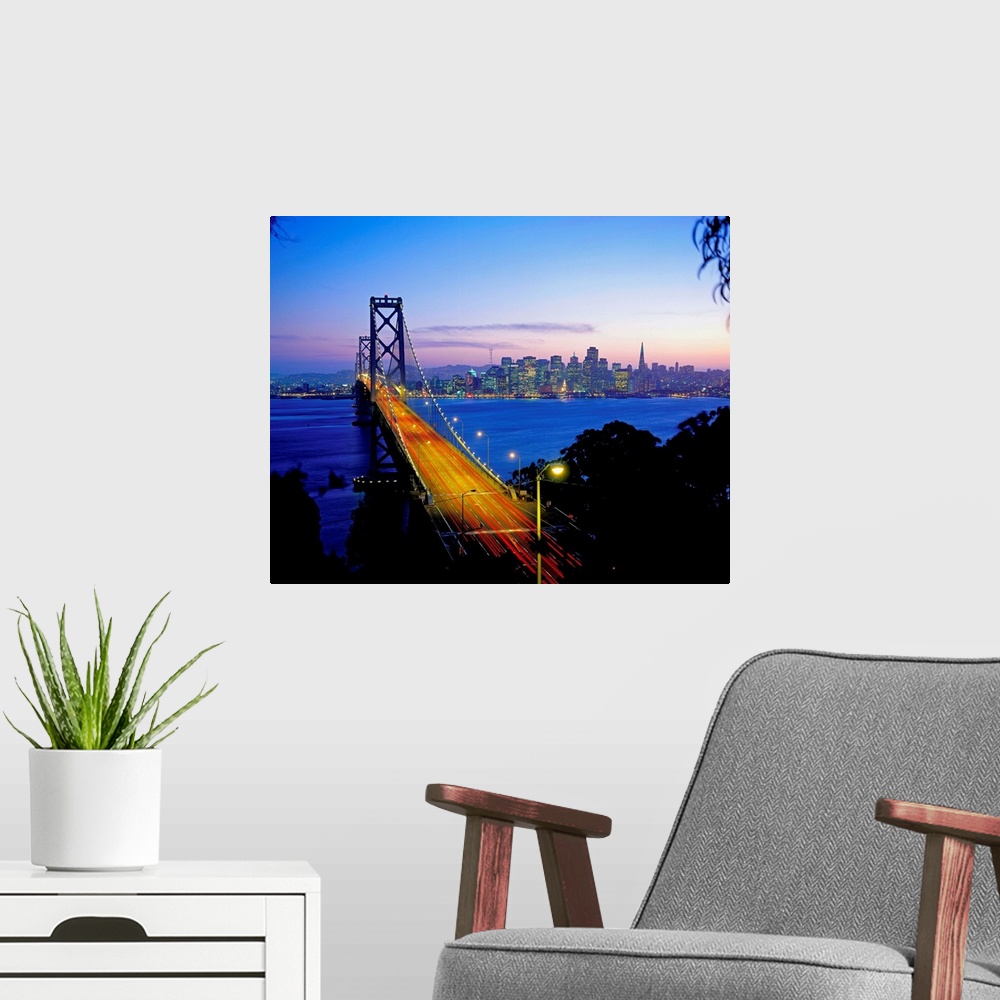 A modern room featuring California, San Francisco, Bay Bridge and skyline at night