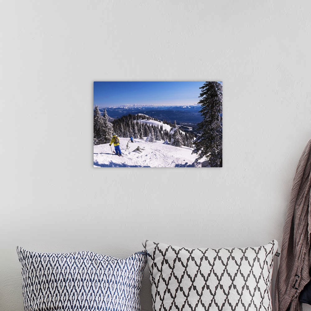 A bohemian room featuring Canada, British Columbia, Rossland, Skiers at Red Mountain Ski Resort.