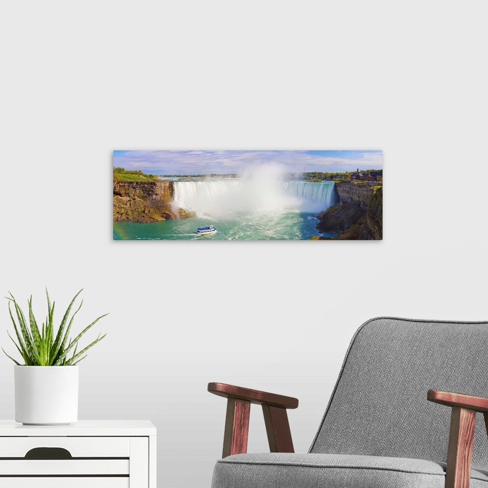 A modern room featuring Canada, Ontario, Niagara Falls, The Canadian Horseshoe Falls (709m) with Maid of the Mist tourist...