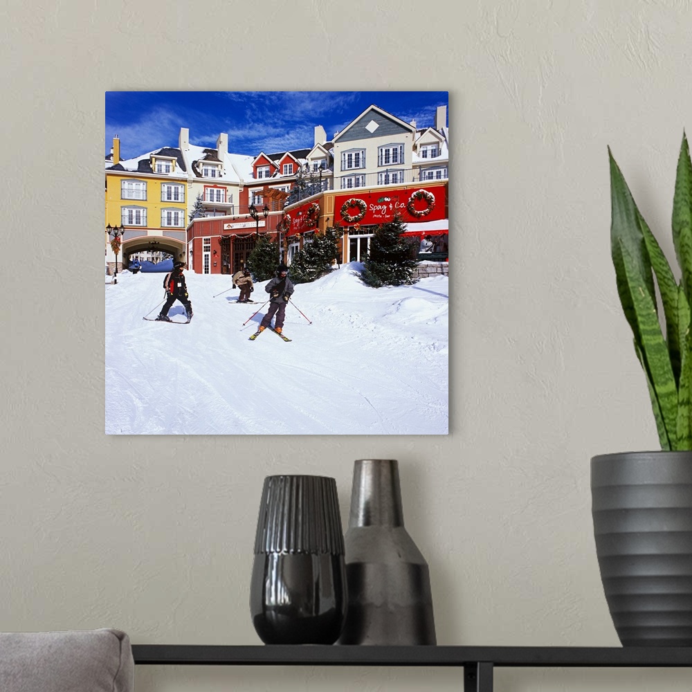 A modern room featuring ALBERTO BISCAR0.Canada - Quebec  Laurentides Mont Tremblant  - .Skiers at village