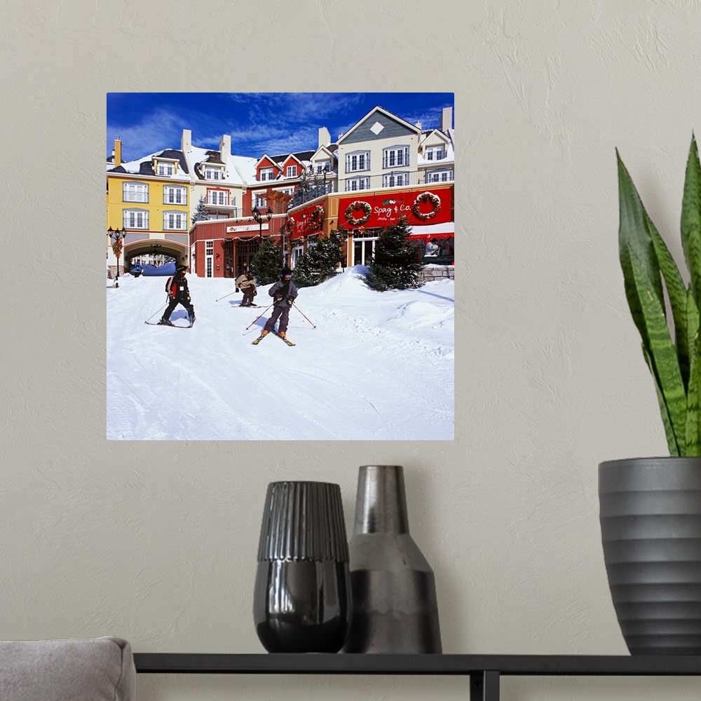 A modern room featuring ALBERTO BISCAR0.Canada - Quebec  Laurentides Mont Tremblant  - .Skiers at village