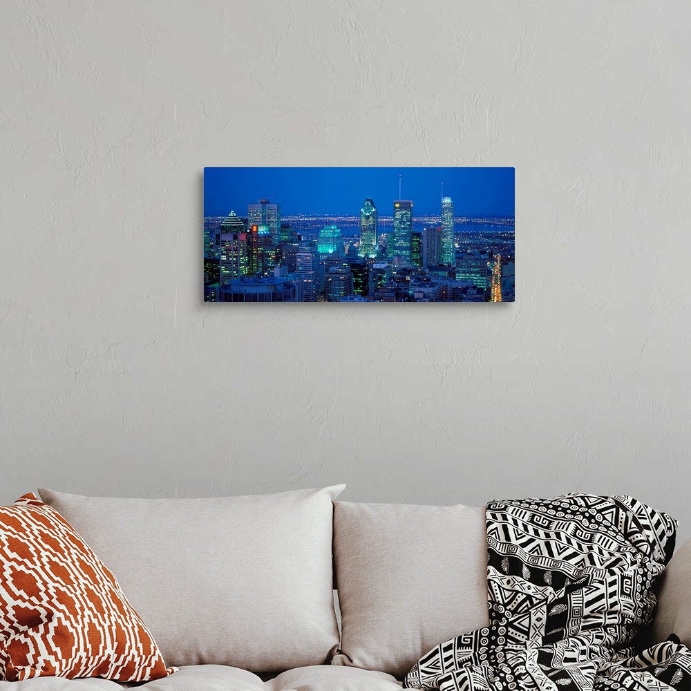A bohemian room featuring Montreal, Quebec, Canada, April 20, 2001. City skyline at dusk..Photo:Alberto Biscaro