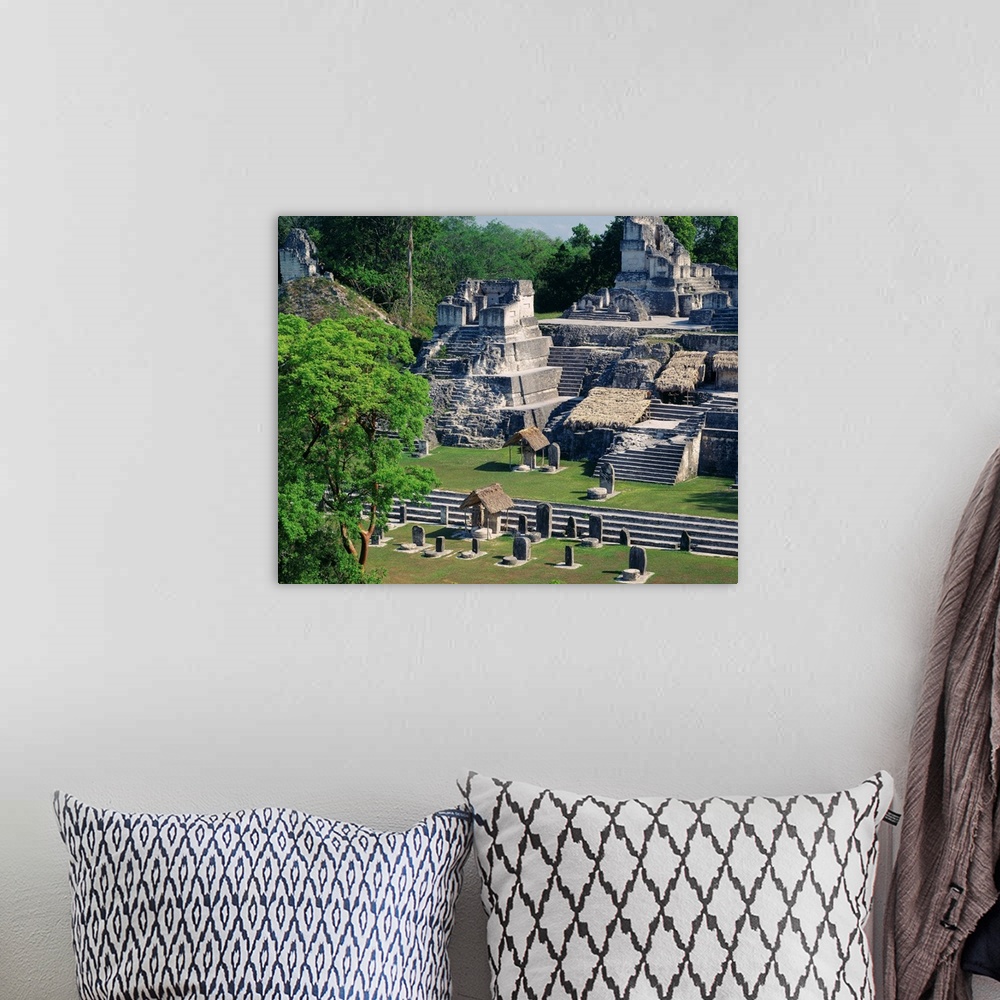 A bohemian room featuring Central America, Guatemala, Tikal, Great Plaza, mayan ruins