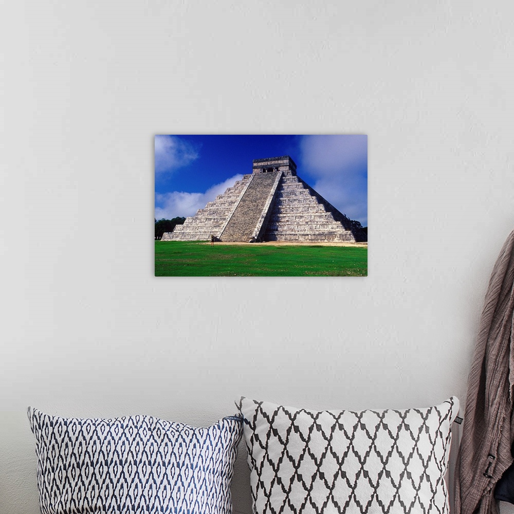 A bohemian room featuring The Pyramid of Kukulcan, also known as "El Castillo", is the most important monument of Chichen I...