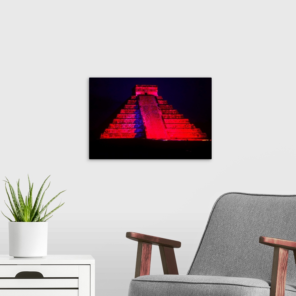 A modern room featuring The Pyramid of Kukulcan, also known as "El Castillo", is the most important monument of Chichen I...