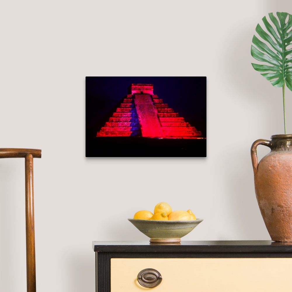 A traditional room featuring The Pyramid of Kukulcan, also known as "El Castillo", is the most important monument of Chichen I...
