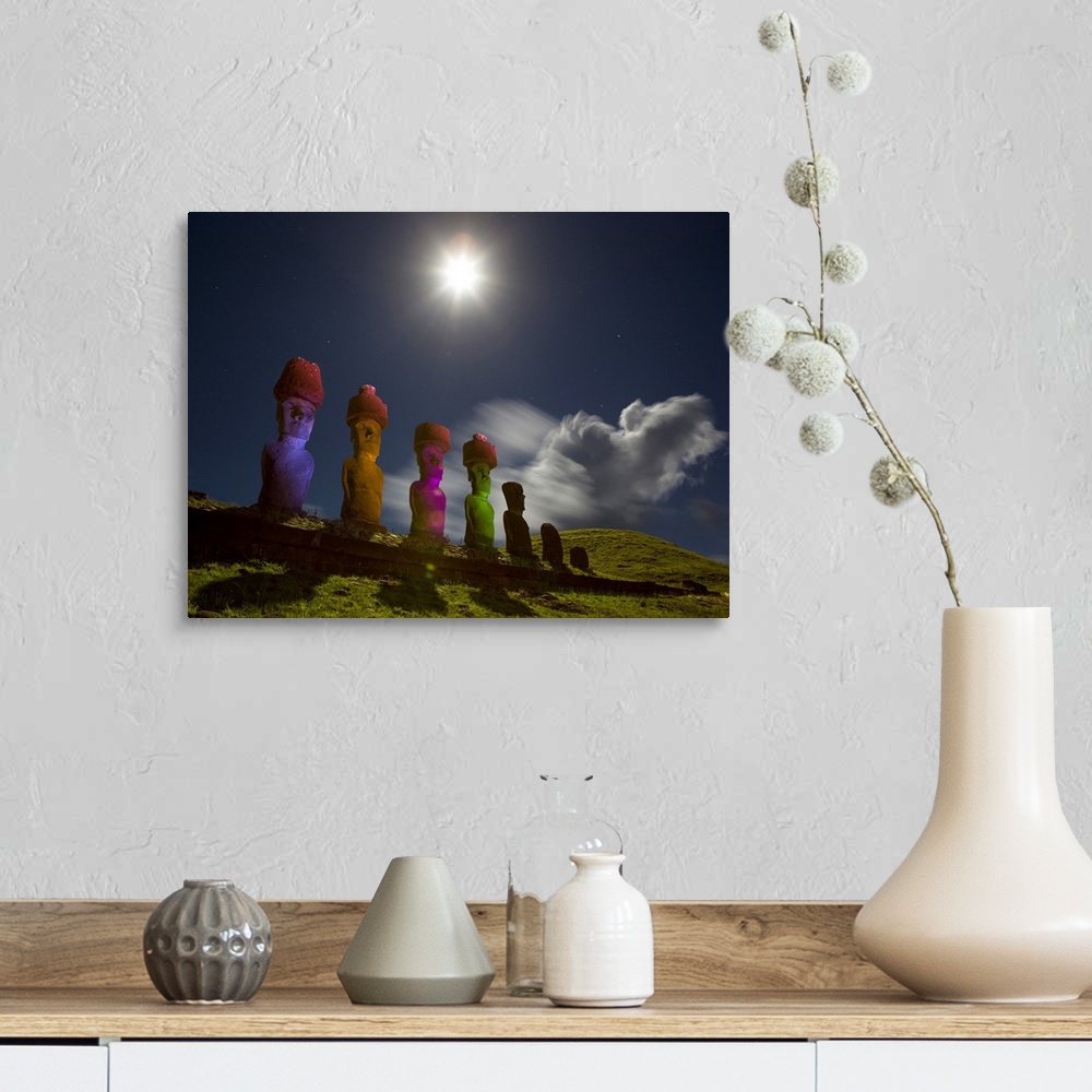 A farmhouse room featuring Chile, Valparaiso, Rapa Nui National Park, Easter Island, Ancient statues illuminated at night, A...