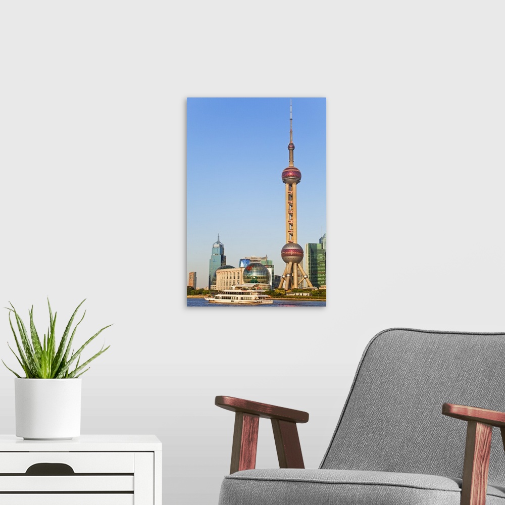 A modern room featuring China, Shanghai, Pudong, Oriental Pearl Tower, Lujiazui Financial District skyline with Oriental ...