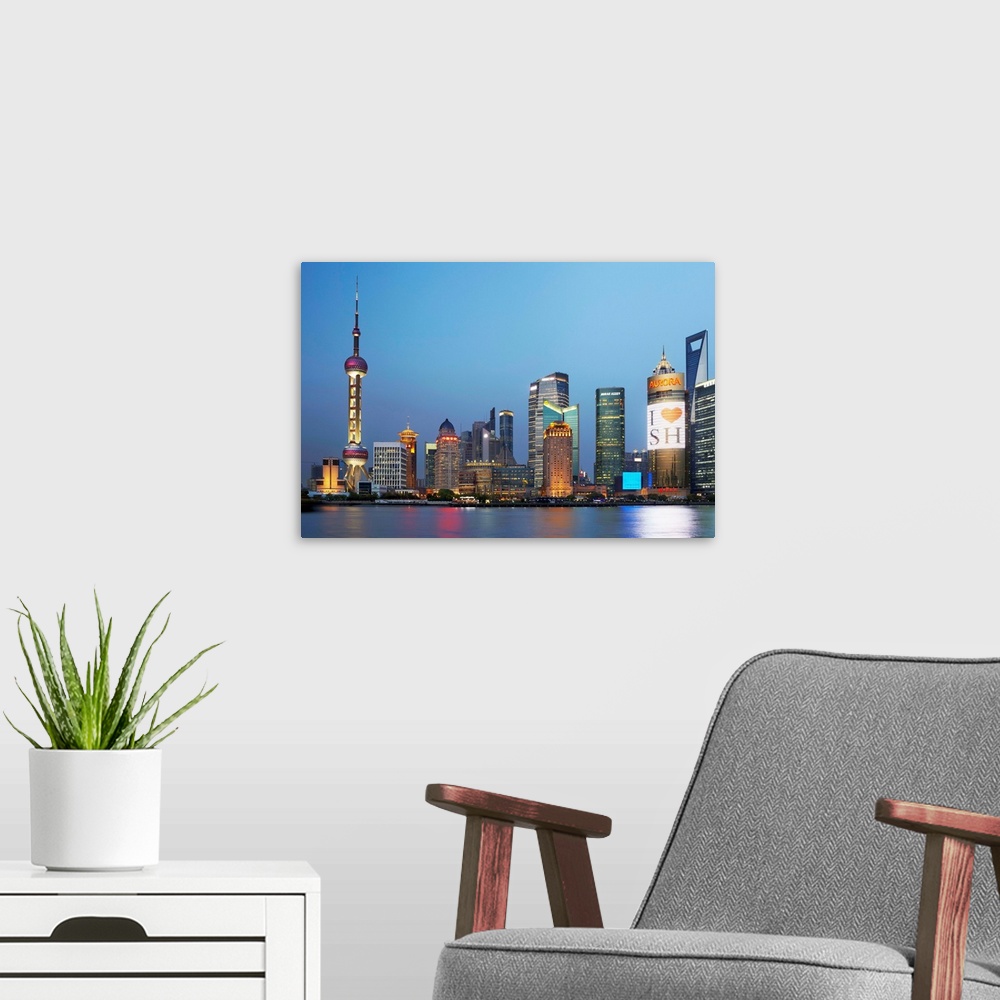 A modern room featuring China, Shanghai, Pudong, Oriental Pearl Tower, Skyline with Oriental Pearl Tower and Huangpu Rive...