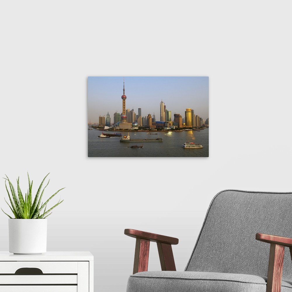 A modern room featuring China, Shanghai Shi, The Huangpu River and many of the new towers of Pudong