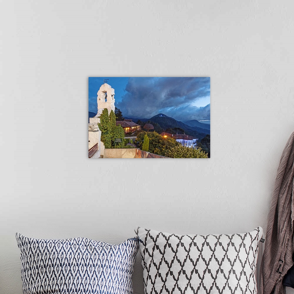 A bohemian room featuring Colombia, Bogota, night scene from Monserrate hill