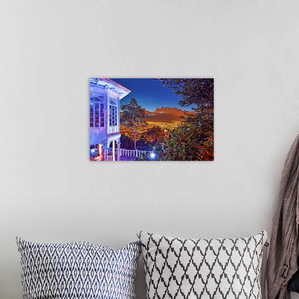 A bohemian room featuring Colombia, Bogota, night scene from Monserrate hill