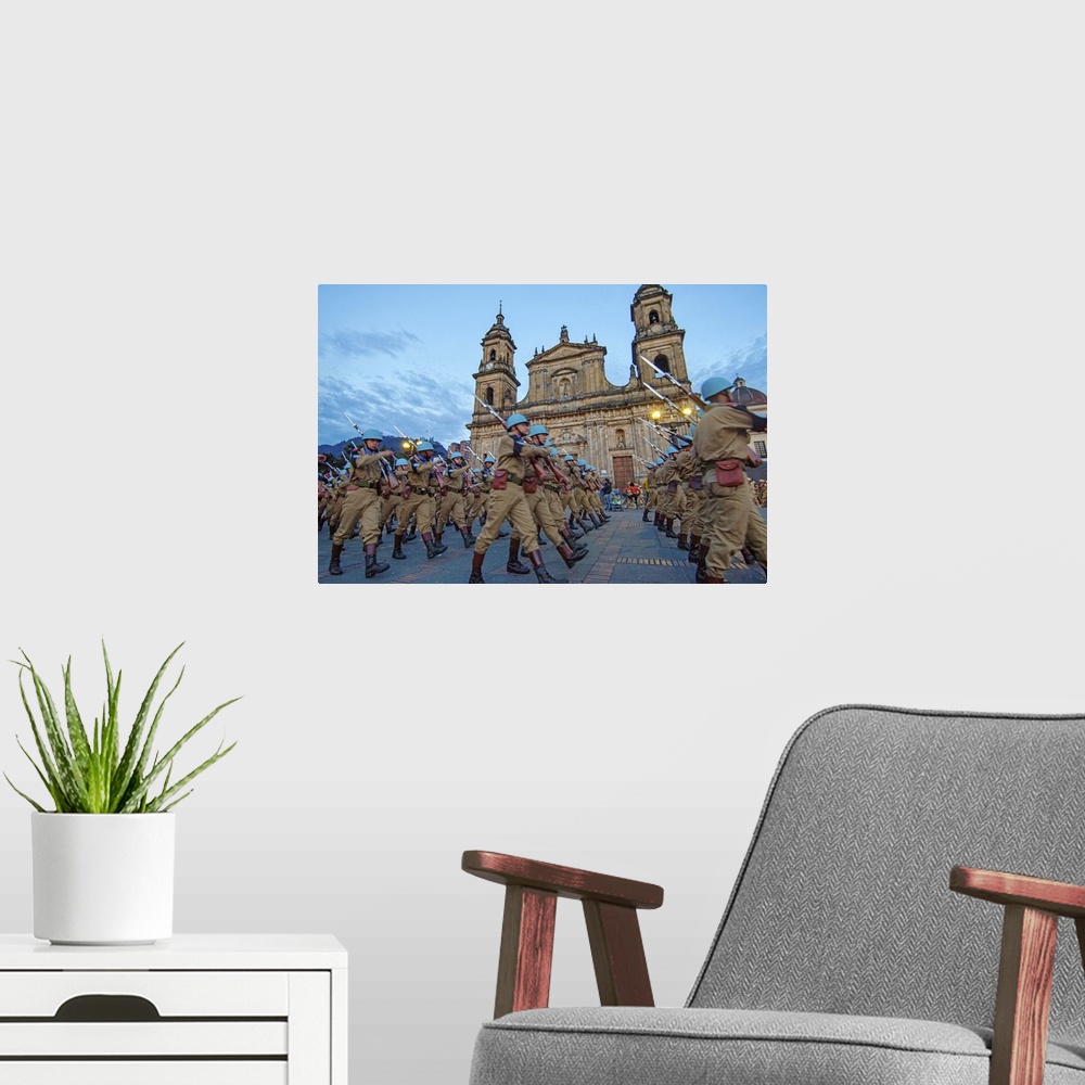A modern room featuring Colombia, Bogota, UN soldiers marching at Bolivar square