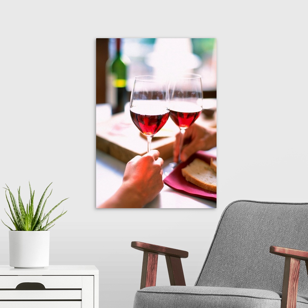 A modern room featuring Couple with glasses of wine