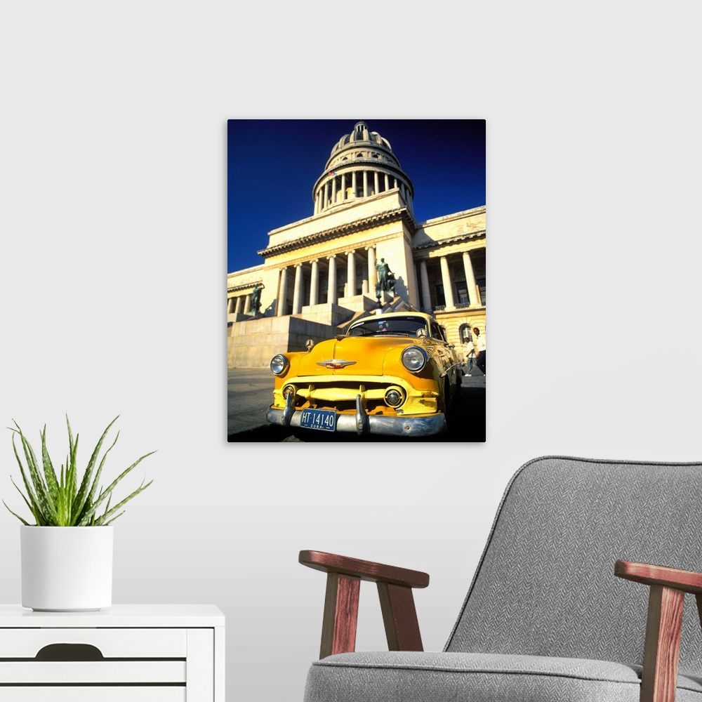 A modern room featuring Cuba, Havana, Vintage car in front of Capitolio Nacional