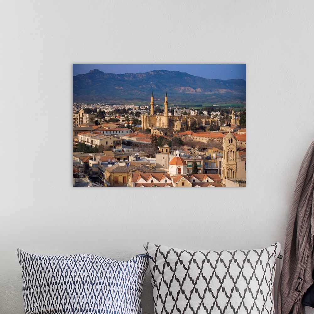 A bohemian room featuring Cyprus, K.pros, Nicosia, Lefkosia, View of the city with Selimiye mosque and Kyrenia mounts in ba...