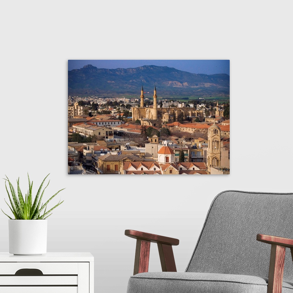 A modern room featuring Cyprus, K.pros, Nicosia, Lefkosia, View of the city with Selimiye mosque and Kyrenia mounts in ba...
