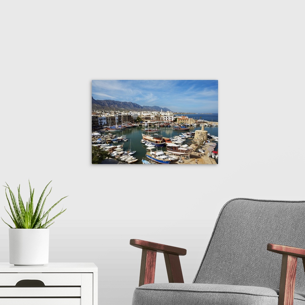 A modern room featuring Cyprus, Northern Cyprus, Kyrenia, Tourist boats leaving the Harbour
