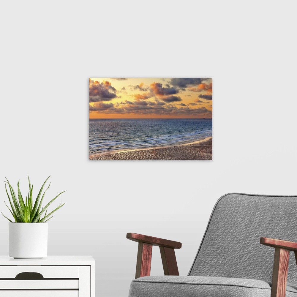 A modern room featuring England, Cornwall, Newquay, Watergate Bay, sunset