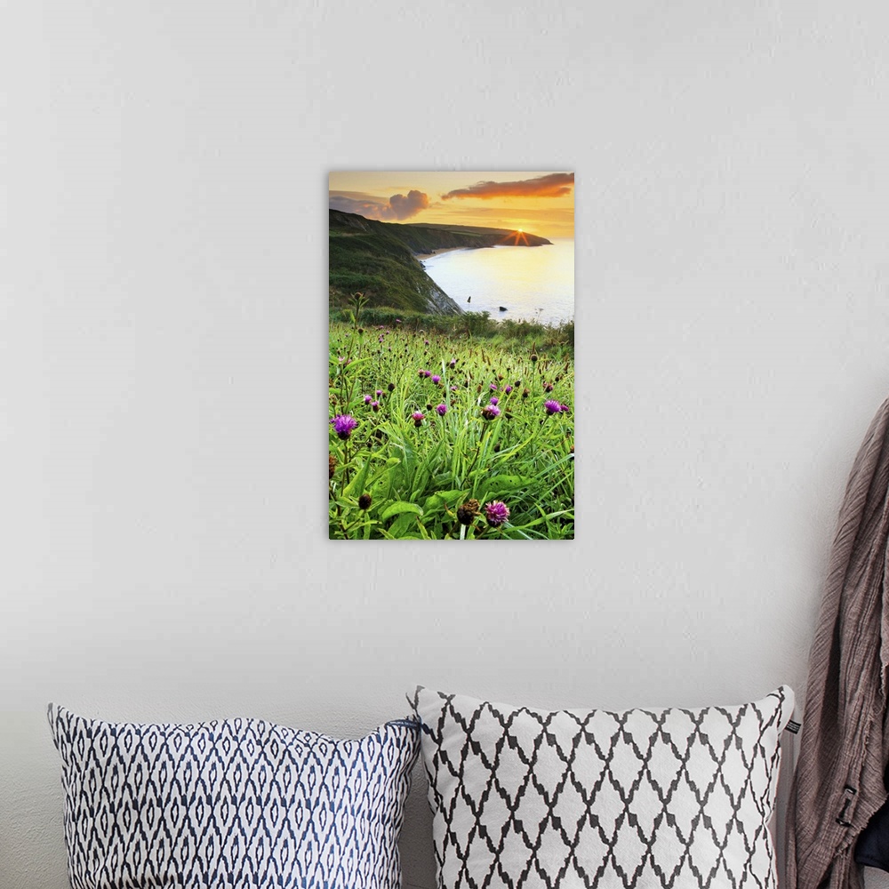 A bohemian room featuring England, Cornwall, Sun rising on Porthbeor beach, St Anthony's Head, Roseland peninsula