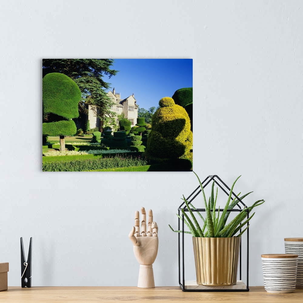 A bohemian room featuring England, Cumbria, Levens Hall Topiary Gardens, the famous gardens near Kendal town